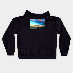 Dramatic sky over the sea with rocks Kids Hoodie